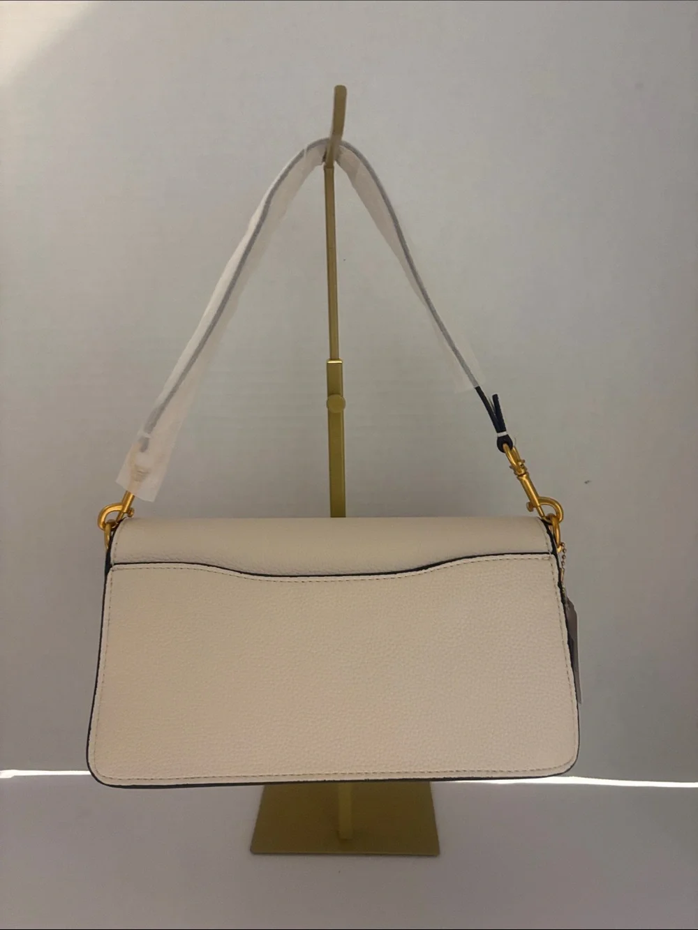 Coach Cream Pebbled Leather Clutch with Gold 'C' Accent